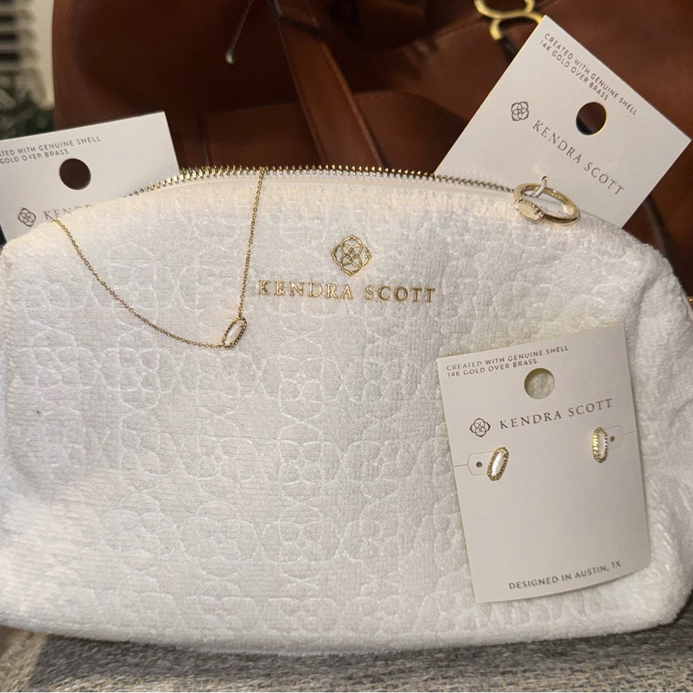 Kendra Scott Ring, necklace, earrings & White Cosmetic Bag with Shimmery Finish